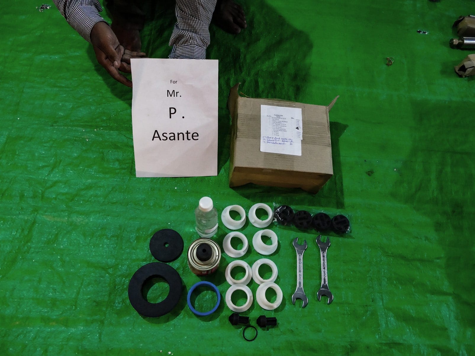P1070009 Rubber seals, washers and spanners for an India Mark 2 hand pump repair kit, sorted for a customer order