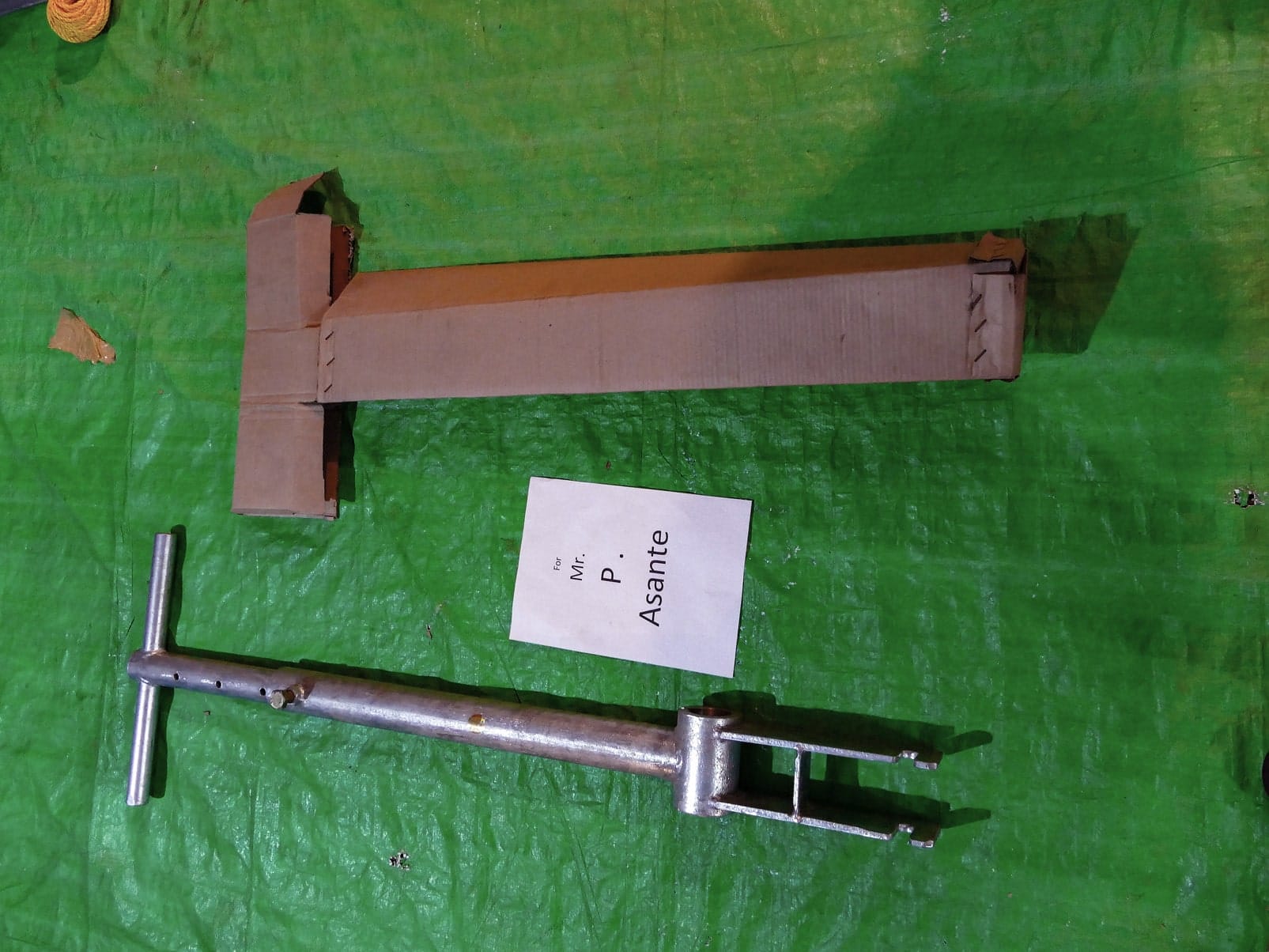 P1070019 Hand pump handle and connecting rod assembly labeled and packed for a customer order