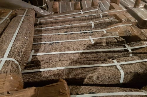 20170223_115336 Hessian-wrapped hand pump cylinders stacked and strapped for shipment at the SKI factory